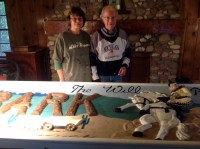 Colonels Dahl restore historical Will Rogers sign at Camp Wonderland.