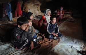 Fleeing bombardment of their village by Syria's Assad regime, 